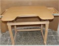 Height adjustable table for wheelchair users